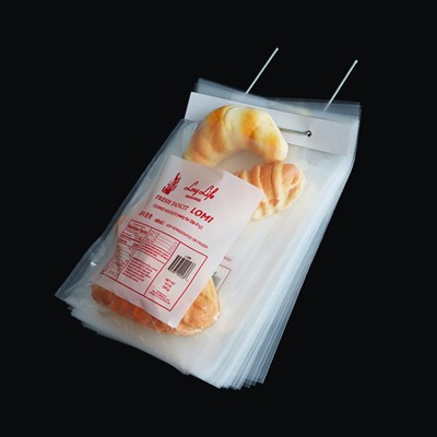 Embalatge automàtic de bosses de pa amb wicket