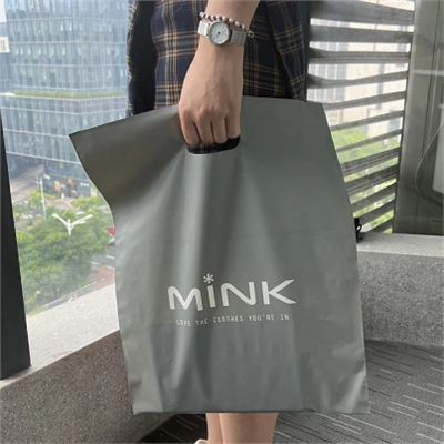 Logotip de disseny de bossa amb mànec imprès